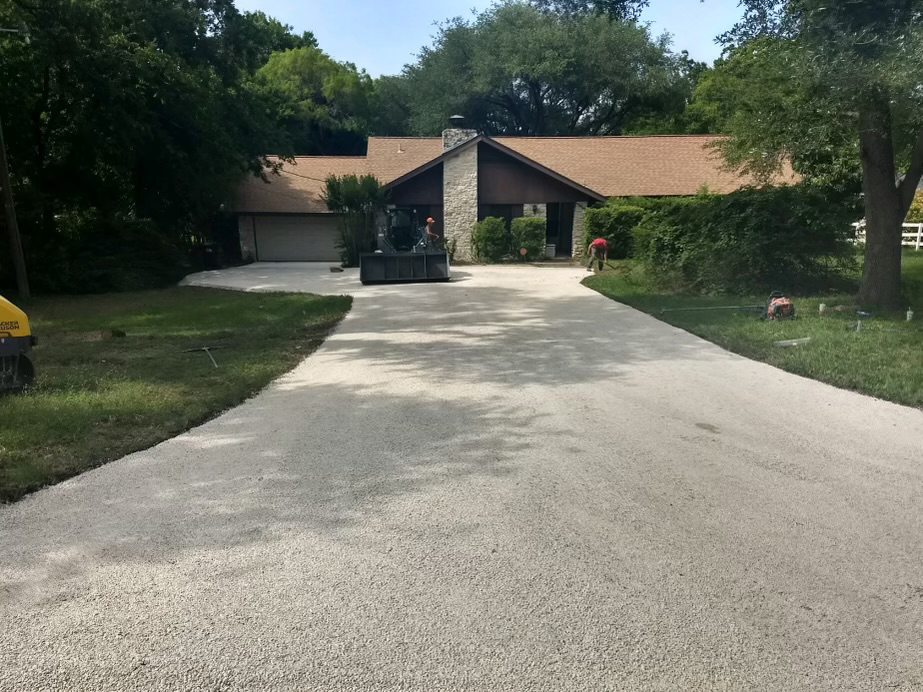 A driveway surface and entrance.